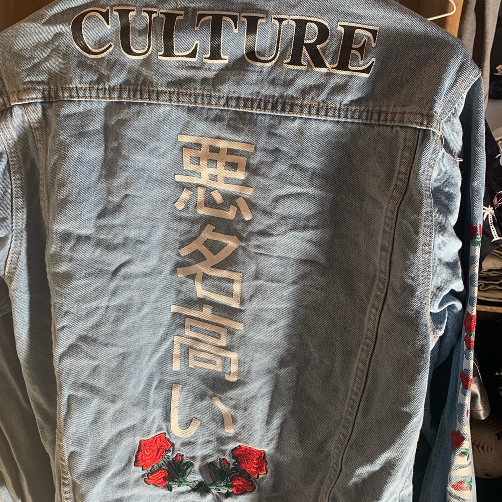 Rue21 denim jacket,size small,colors blue,red,and white